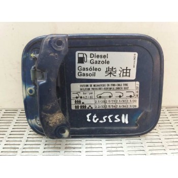 TAPA EXTERIOR COMBUSTIBLE 