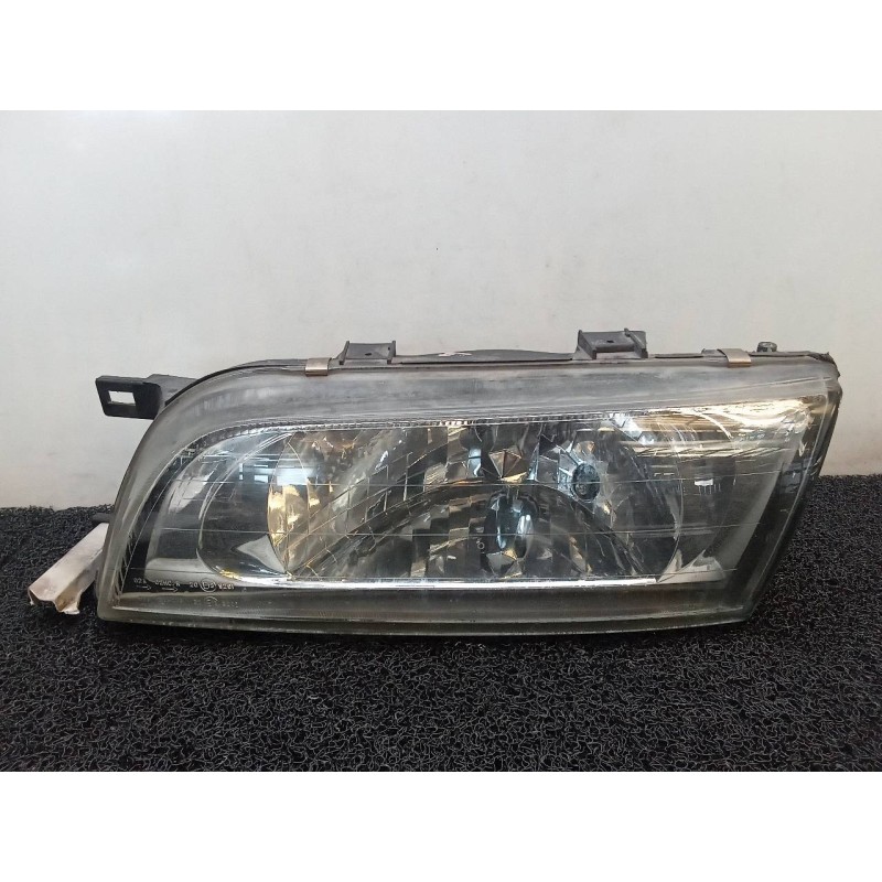 Recambio de faro izquierdo para nissan almera (n15) gx referencia OEM IAM   