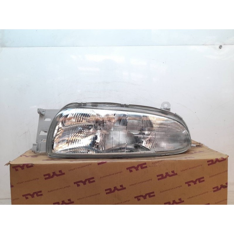 Recambio de faro izquierdo para ford fiesta berlina referencia OEM IAM 203586452 28858 